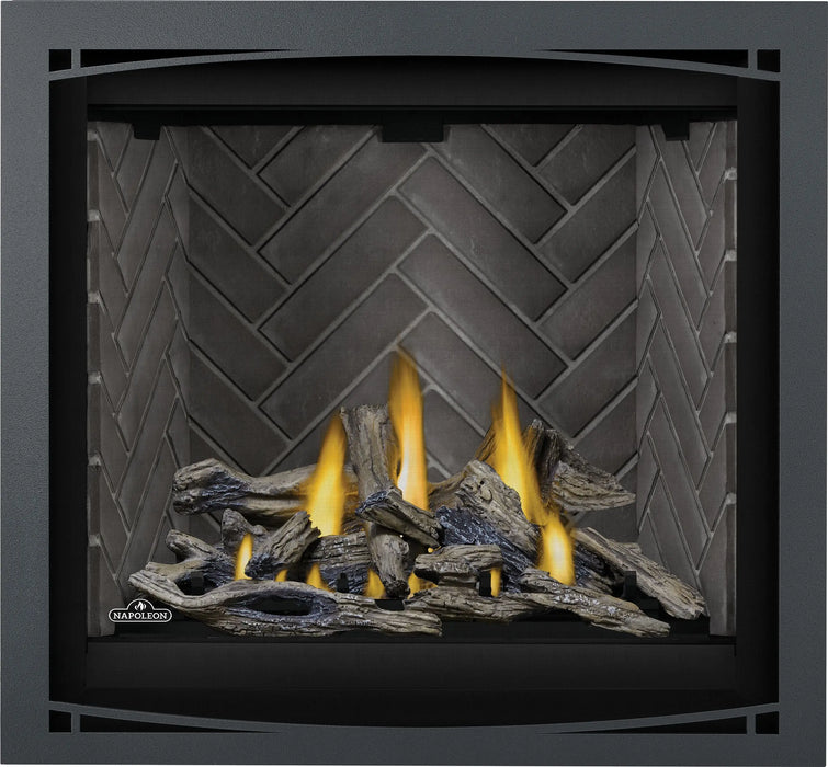 Napoleon Altitude X 36 gas fireplace, front view with driftwood logs, brick panels and charcoal Zen front