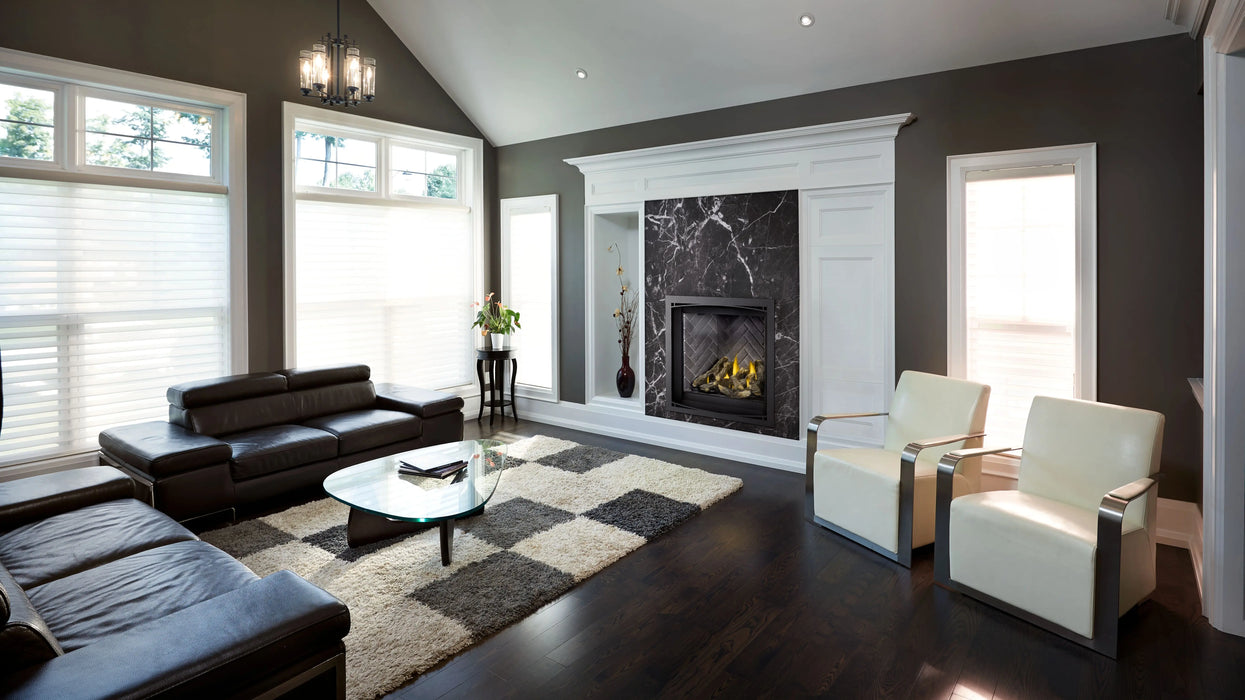 Napoleon Altitude X 36 gas fireplace installed in a room with driftwood logs
