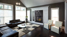 Napoleon Altitude X 36 gas fireplace installed in a room with driftwood logs