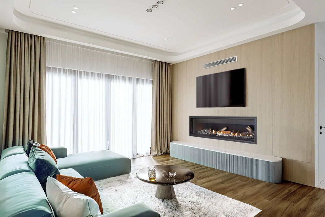 Napoleon Ascent Linear 76 gas fireplace, installed with trim, oak logs and mineral rocks