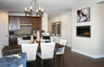 Napoleon Ascent Linear 42 gas fireplace, in a dining room and kitchen