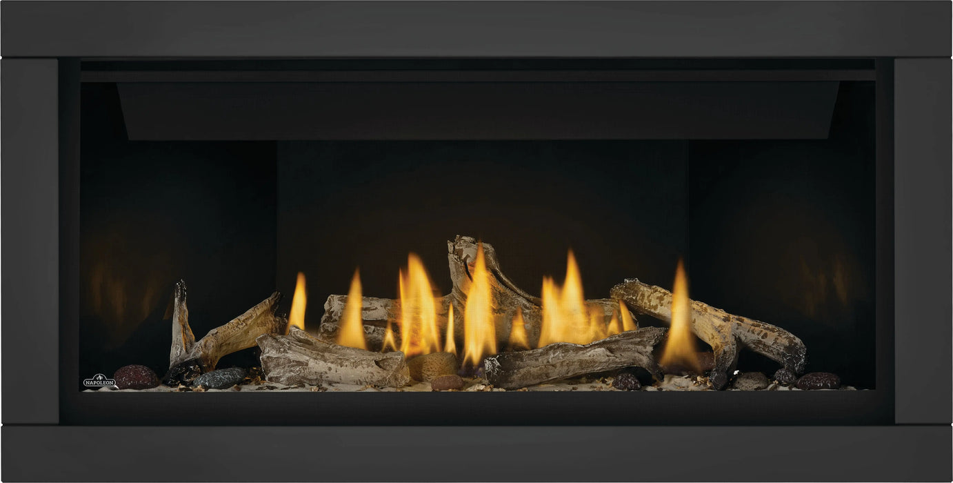Napoleon Ascent Linear 42 gas fireplace, front view with shore fire media, beach fire media, black surround