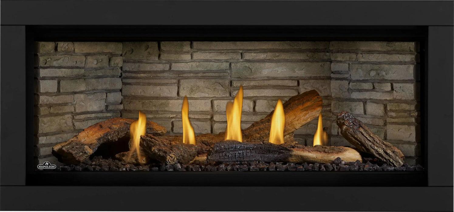 Napoleon Ascent Linear Premium 46 gas fireplace, front view with oak logs, night light on