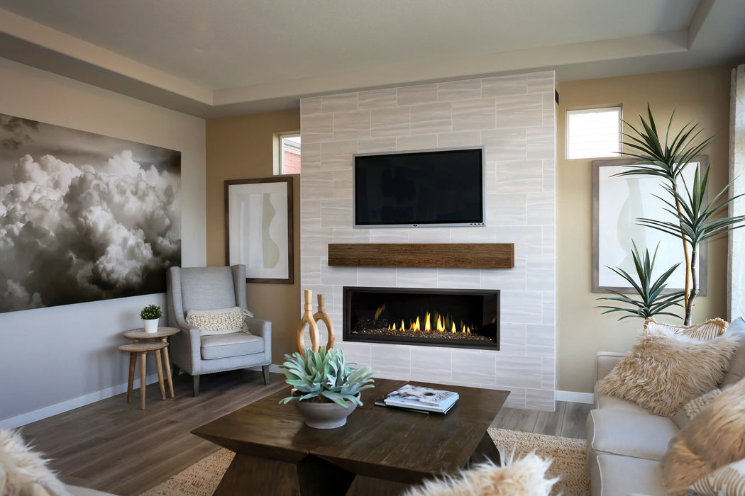 Napoleon Ascent Linear Premium 56 gas fireplace, in a living room with topaz glass embers