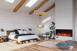 Napoleon Astound 62 FlexMount electric fireplace in a Scandinavian-style bedroom