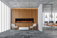 Napoleon Astound 96 built-in electric fireplace in an office with birch logs and black crystals