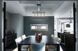 Napoleon CLEARion Elite electric fireplace in a dining room, glass in see-through mode