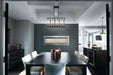 Napoleon CLEARion Elite electric fireplace in a dining room, glass in opaque mode