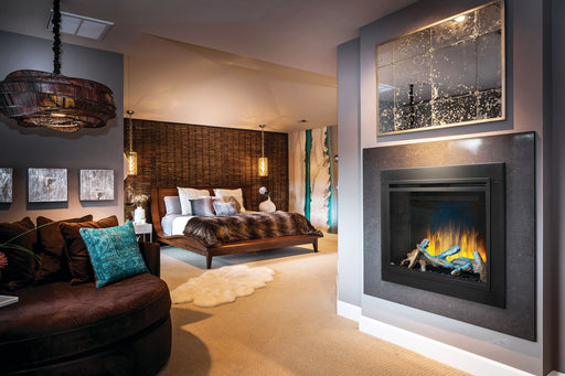 Napoleon Element Series 42 Built-in Electric Fireplace NEFB42H-BS-1 - installed in a bedroom wall with a stone surround