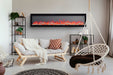 Napoleon Entice Series Wall-Hanging Electric Fireplace - wall mounted above a sofa, wider view