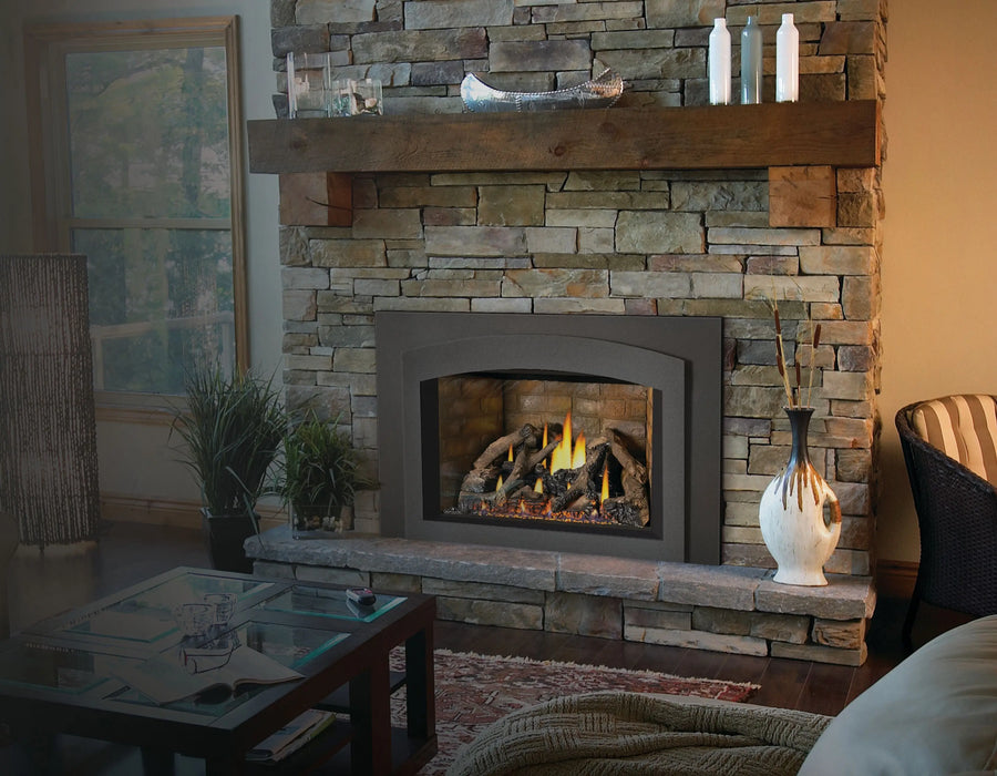 Napoleon Oakville X4 gas fireplace insert in a stone fireplace