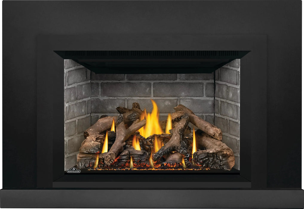 Napoleon Oakville X4 gas fireplace insert, small black face with Westminster panels and riser box
