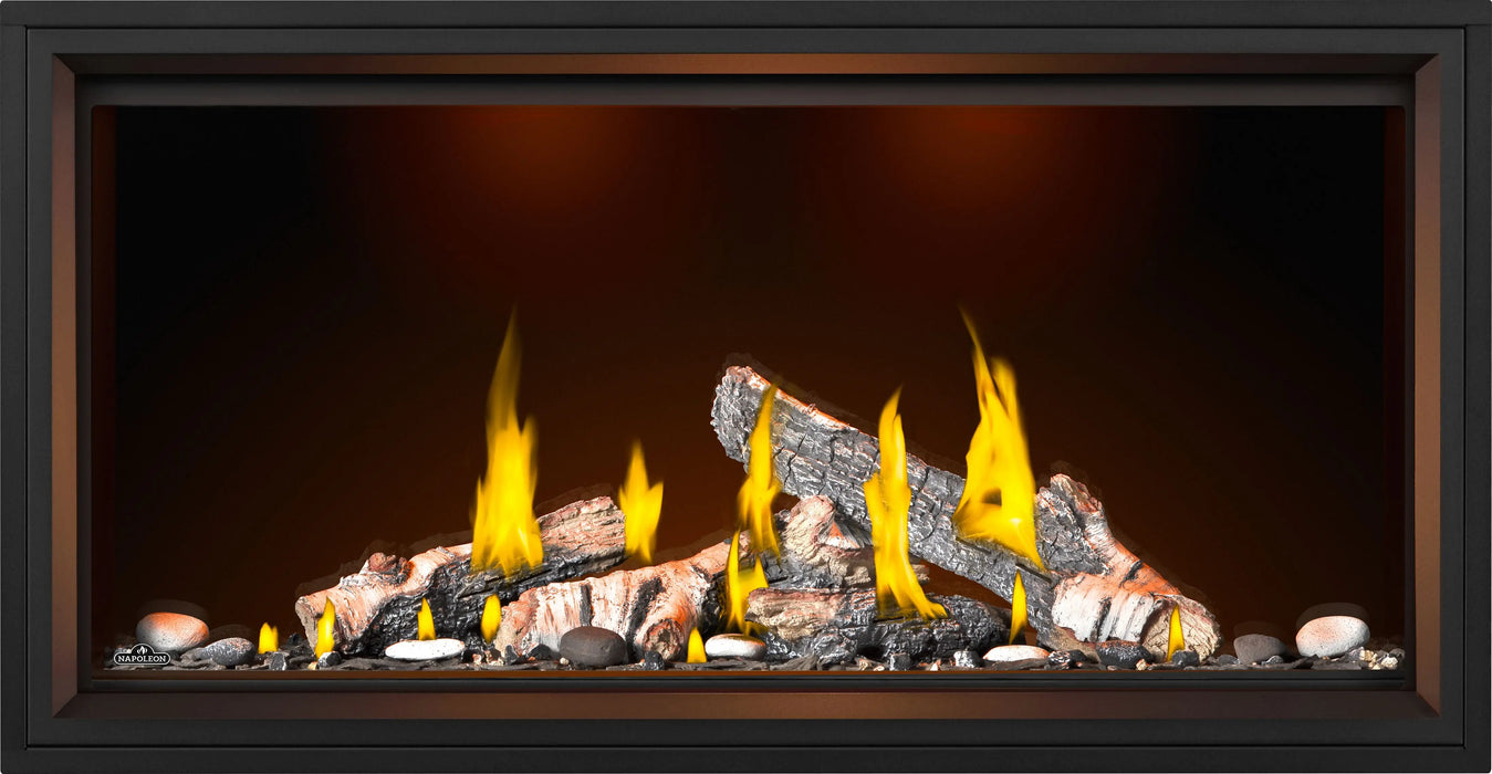 Napoleon Tall Vector 50 gas fireplace with Luminous Logs, front view with birch logs, top lights on