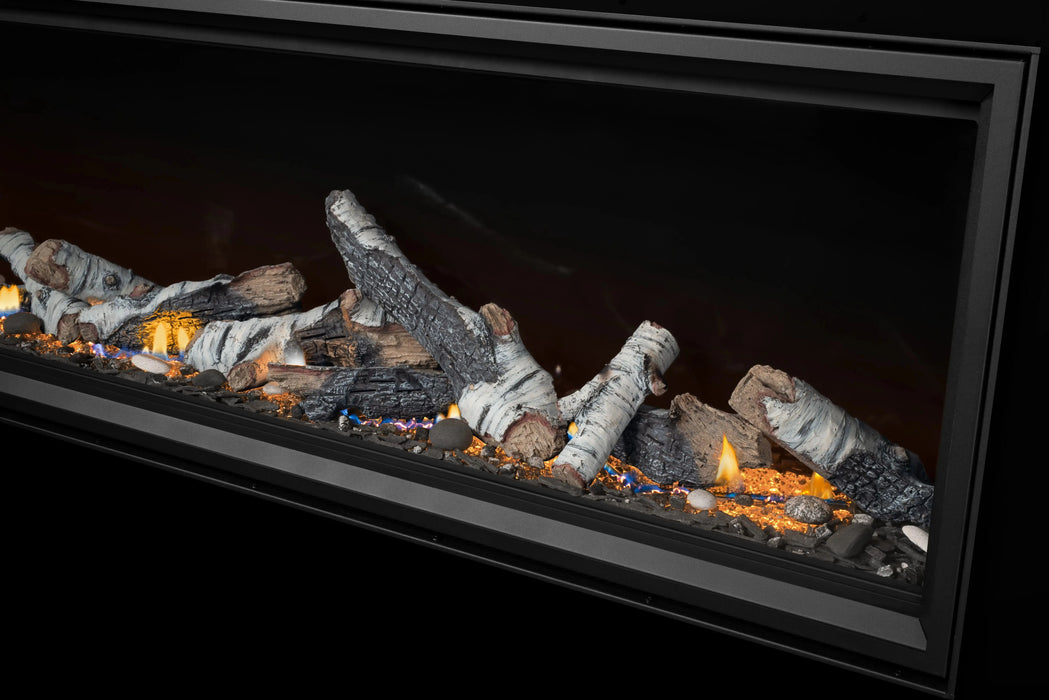 Napoleon Tall Vector 74 gas fireplace with Luminous Logs, detail view with birch logs, low flames and glowing ember bed