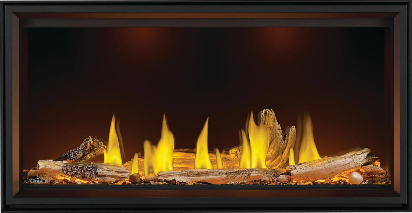 Napoleon Tall Vector 50 gas fireplace, front view with driftwood logs, orange ember lighting