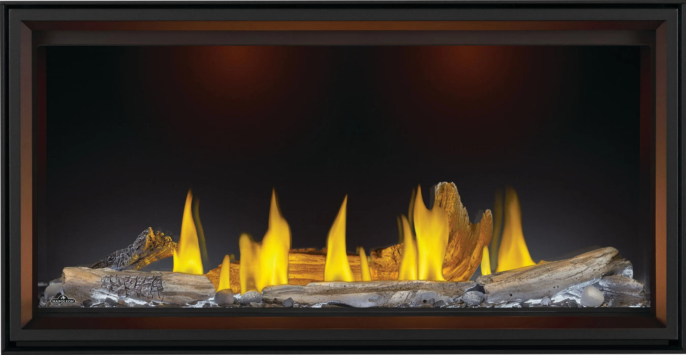 Napoleon Tall Vector 50 gas fireplace, front view with driftwood logs, white ember lighting