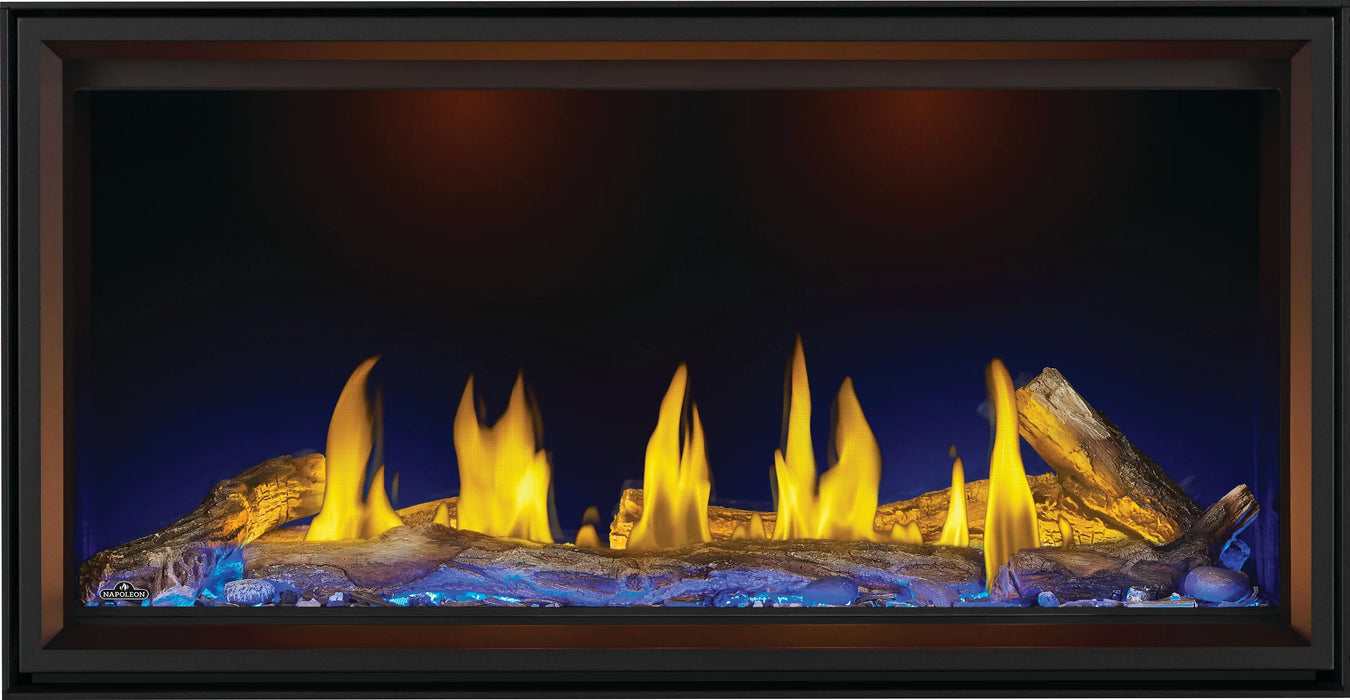 Napoleon Tall Vector 50 gas fireplace, front view with oak logs, blue ember lighting