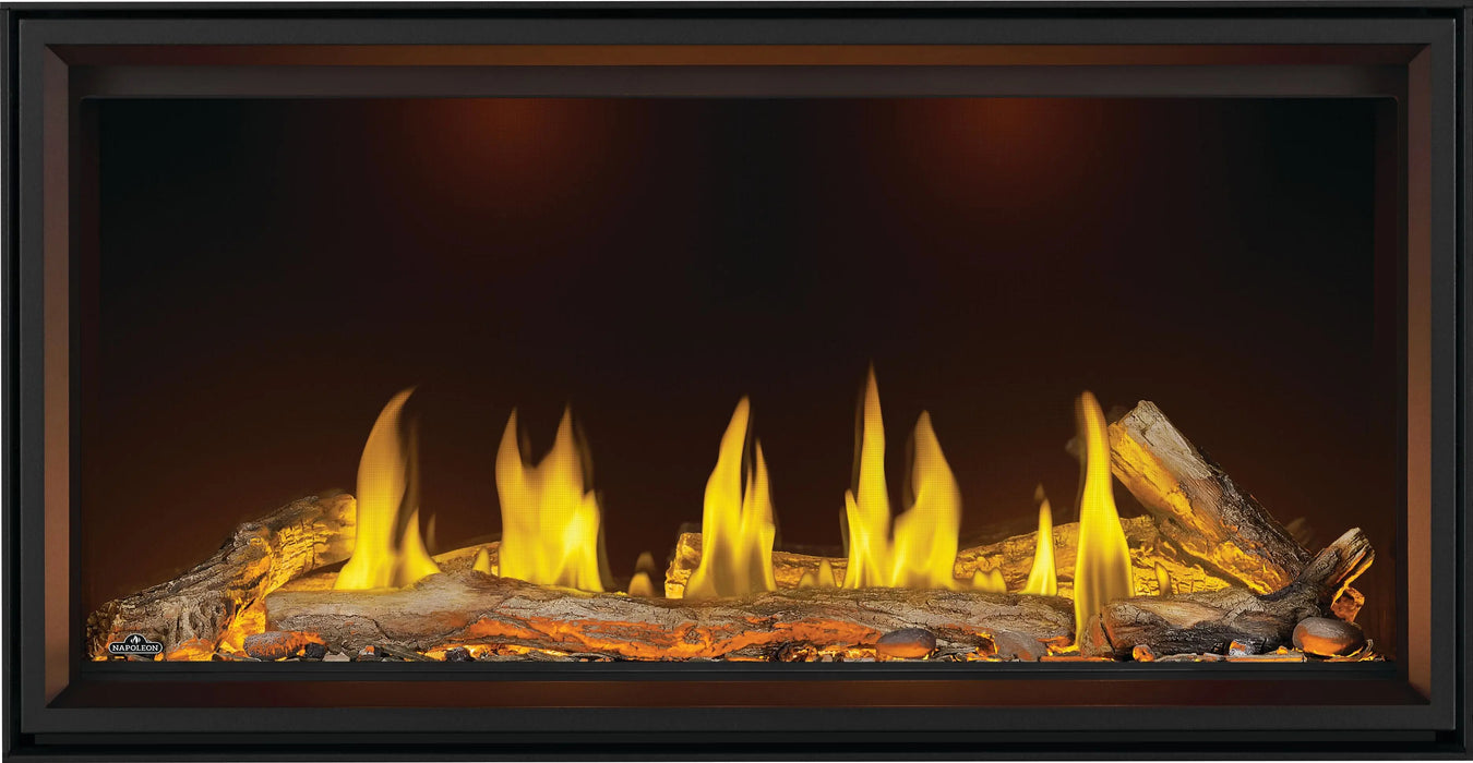 Napoleon Tall Vector 50 gas fireplace, front view with oak logs, orange ember lighting
