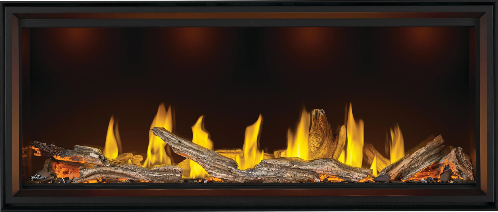 Napoleon Tall Vector 62 gas fireplace, front view with driftwood logs, orange ember lighting