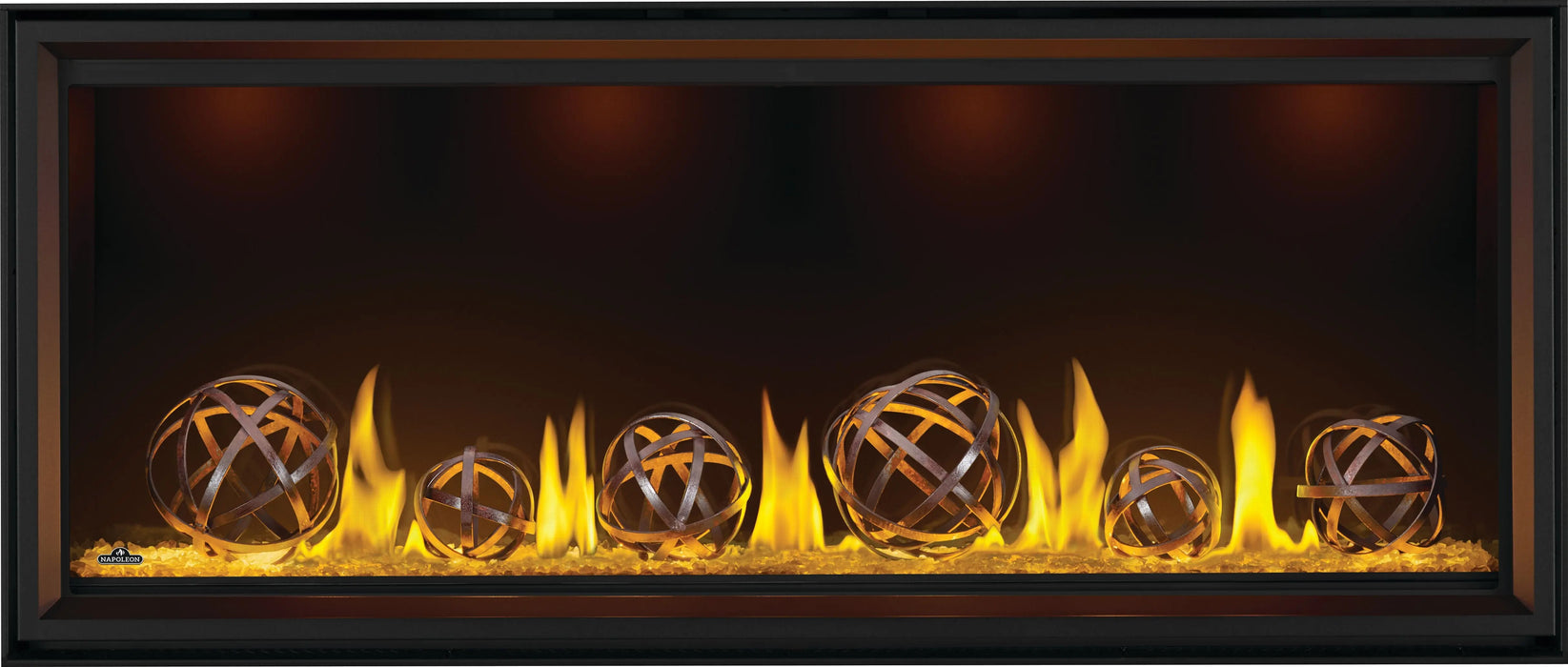 Napoleon Tall Vector 62 gas fireplace, front view with wrought iron globes, clear glass embers, yellow lighting