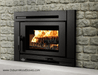 Osburn Matrix Wood Insert - close view in a gray stone fireplace with faceplate
