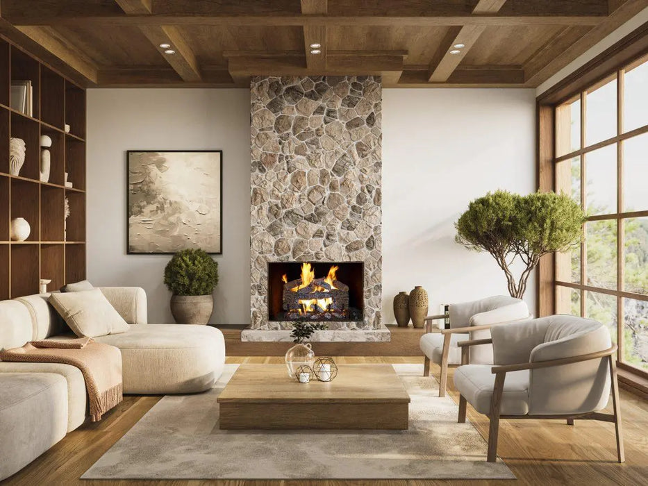 living room with a stone fireplace and gas logs burning