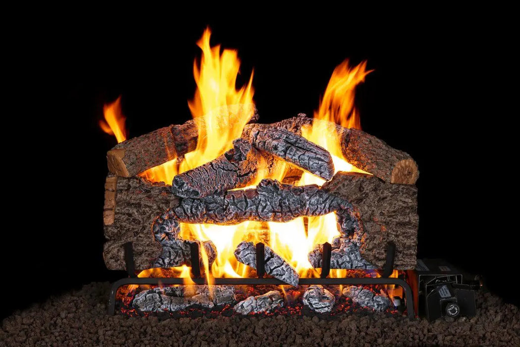 Charred Cinder Oak gas log set burning, front view on black