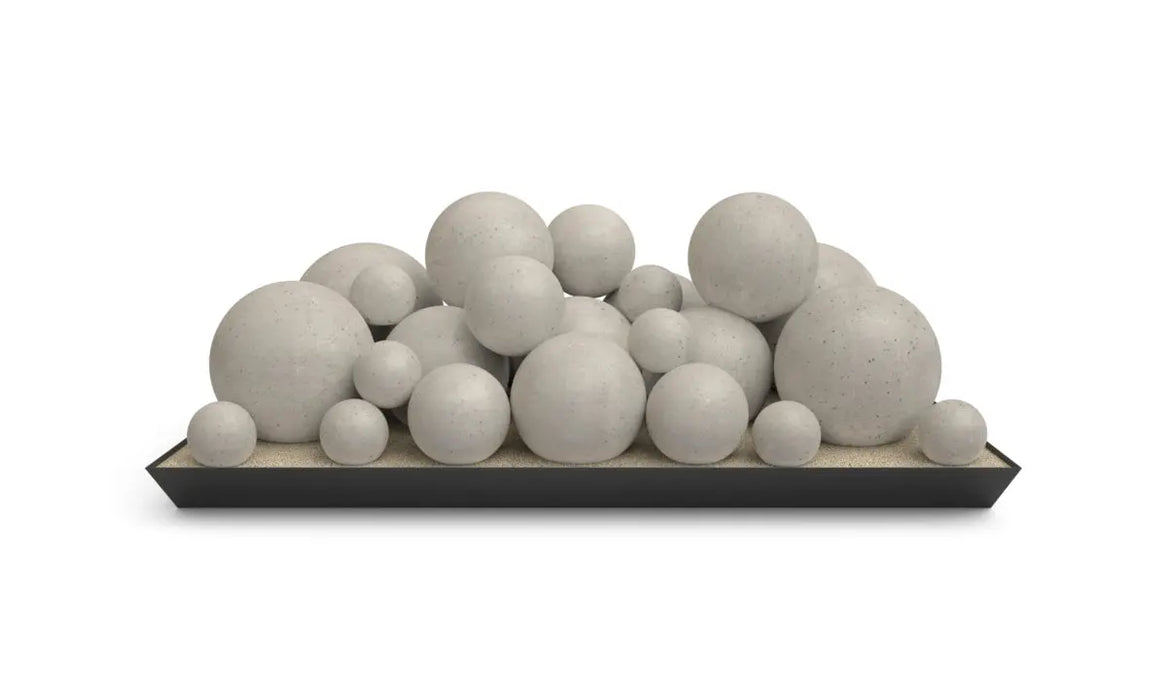 set of gray spheres in mixed sizes arranged on a tray