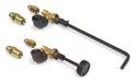two brass manual gas valves with fittings, one with a round knob handle and one with a long extension handle