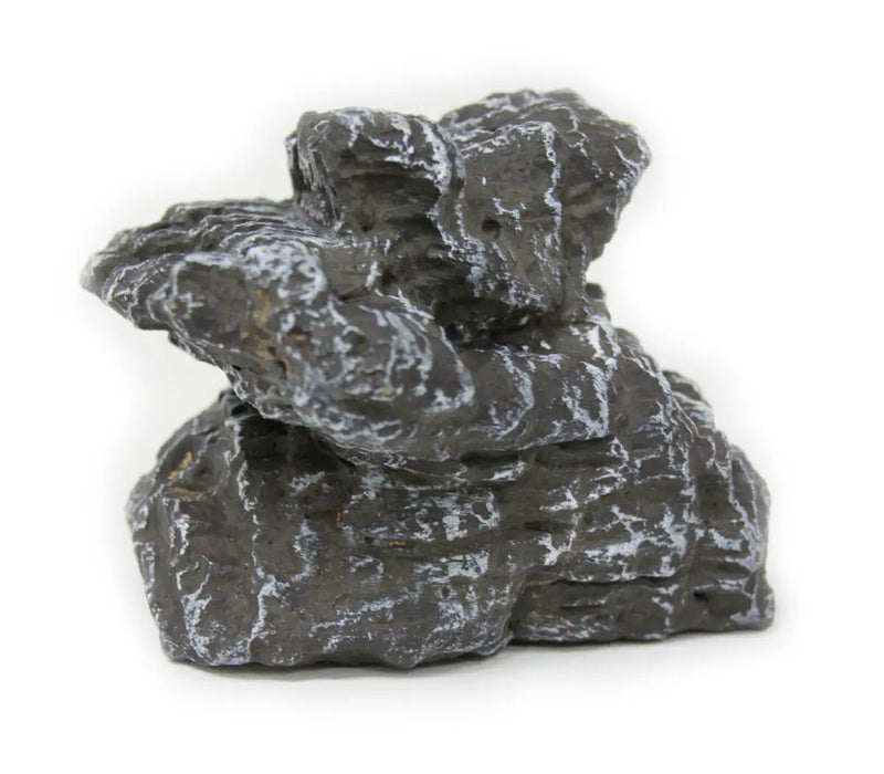 stacked gray and black charred ceramic chunk