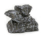 stacked gray and black charred ceramic chunk