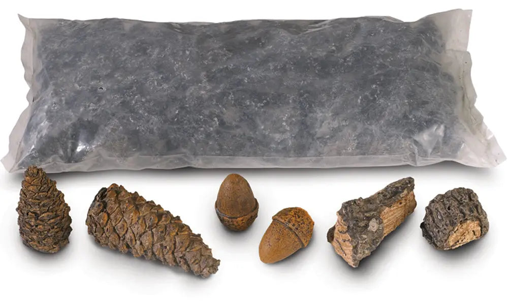 bag of dark coals with ceramic pine cones, wood chips and acorns
