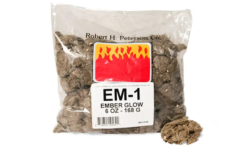 bag of Ember Glow embers with a loose clump beside it