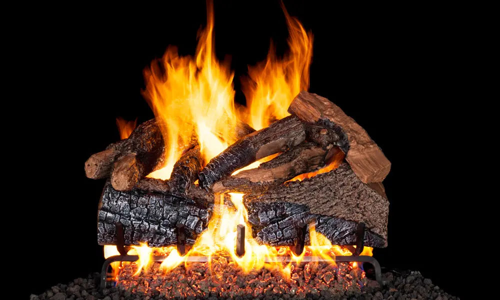 gas logs burning with a glowing rear log and tall flames from a flame enhancer kit