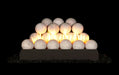 white marble spheres stacked on a G23 burner with flames