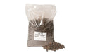 bag of lava granules with a loose pile beside it