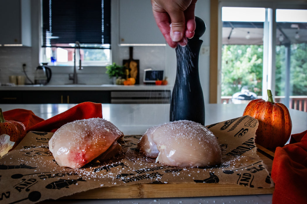 70113 Bamboo Cutting Board – in use, with chicken, view 3