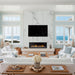 SimpliFire Allusion Edge 60" electric fireplace below a TV in a marble wall in a coastal living room