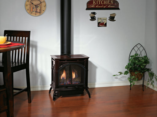 Empire Spirit Small Cast Iron Direct Vent Gas Stove, stove in a dining room corner
