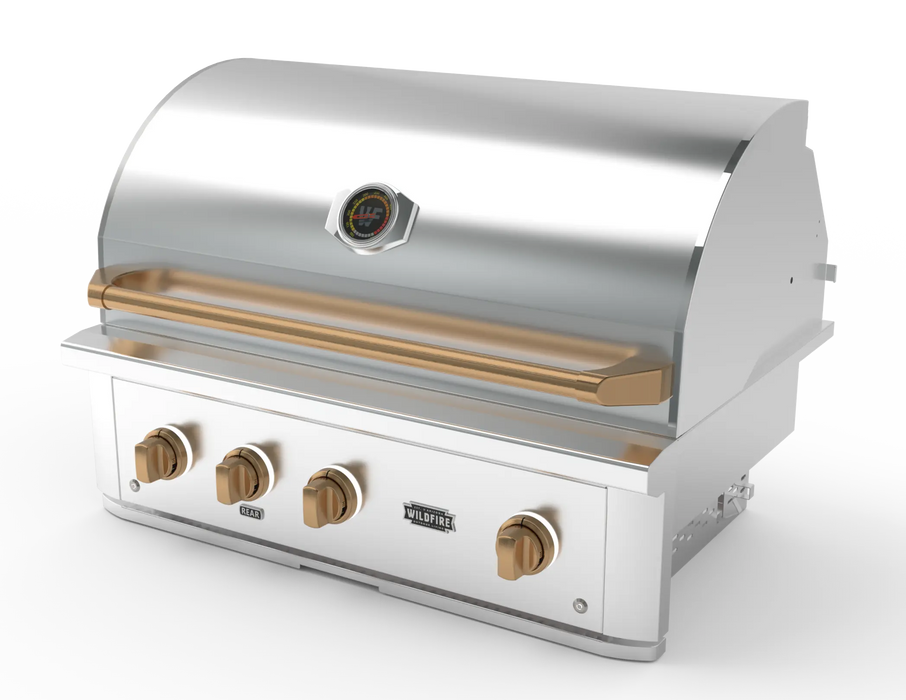Wildfire Ranch Pro 36" gas grill in stainless steel with brushed bronze Designer Finish knobs and handle, angled view