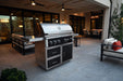 Wildfire Ranch Pro 42" gas grill in black stainless steel on its cart on a patio at dusk