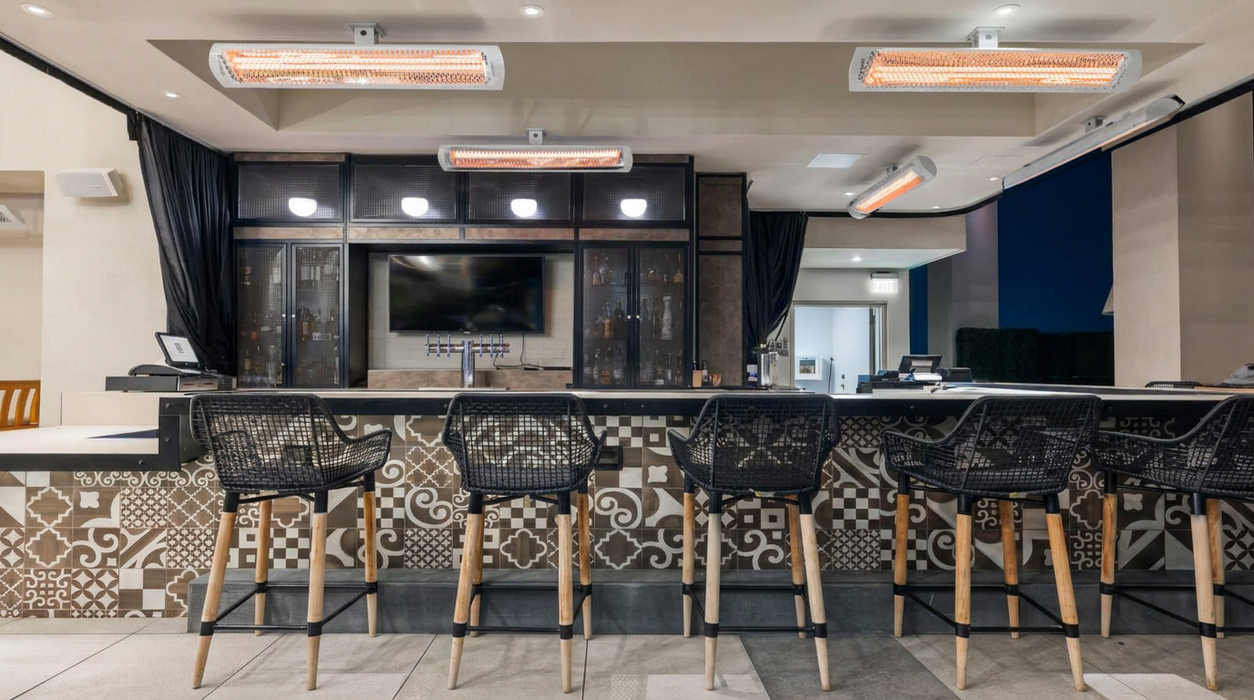 Bromic Tungsten Smart-Heat Electric Select heaters above an outdoor bar