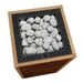 Top view of the HUUM CORE BK sauna heater with thermo-aspen panels and black top grate