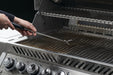 62031 Stainless Steel Grid Scraper – in use, with cooking grids