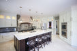Allure™ 38 Vertical Series Wall Hanging Electric Fireplace – installed in a kitchen