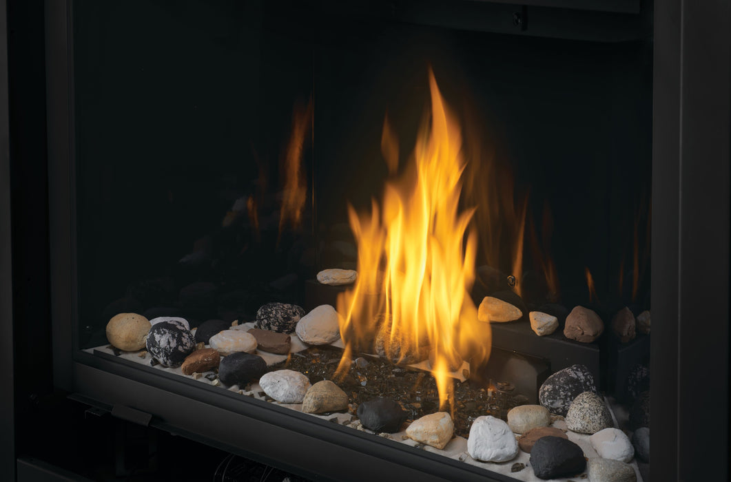 Ascent 46 Direct Vent Gas Fireplace – close-up of shore fire and mineral rock media