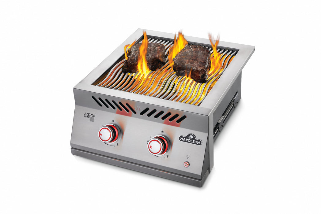 Built-in 700 Series 18" Dual Infrared Burner with Stainless Steel Cover – in use, angled view