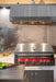 TrueFlame 48" Vent Hood with 2,000 CFM Motor and Mounting Bracket TF-VH48-3 - installed over a TrueFlame 40" grill in an outdoor kitchen