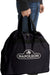 Napoleon Travel Bag for TravelQ 285 Series - black carry bag with Napoleon logo held by a person